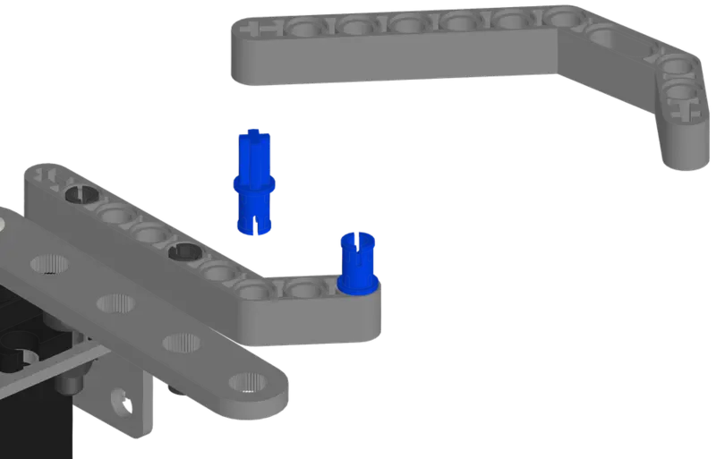 Claw liftarm attached to the axle pin.