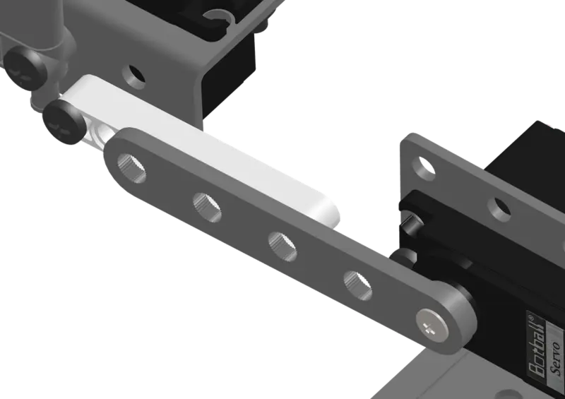 Claw assembly bolted to the arm with the left bolt passing through the bracket.